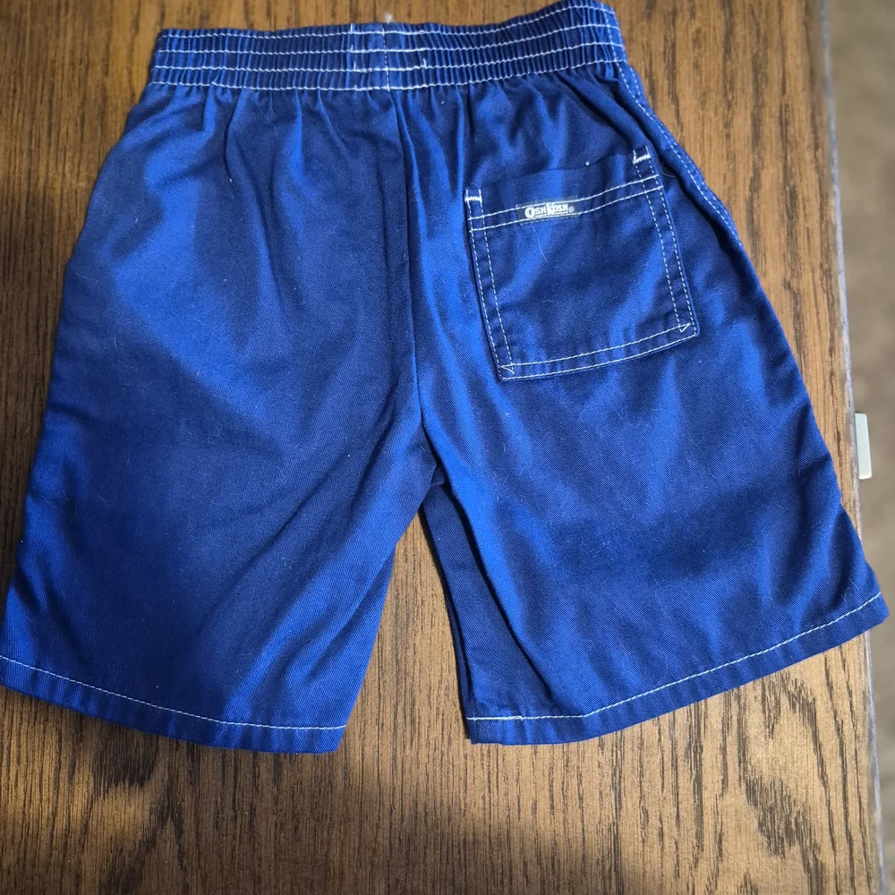 OshKosh B'gosh blue swim trunks size 5 with white stitching